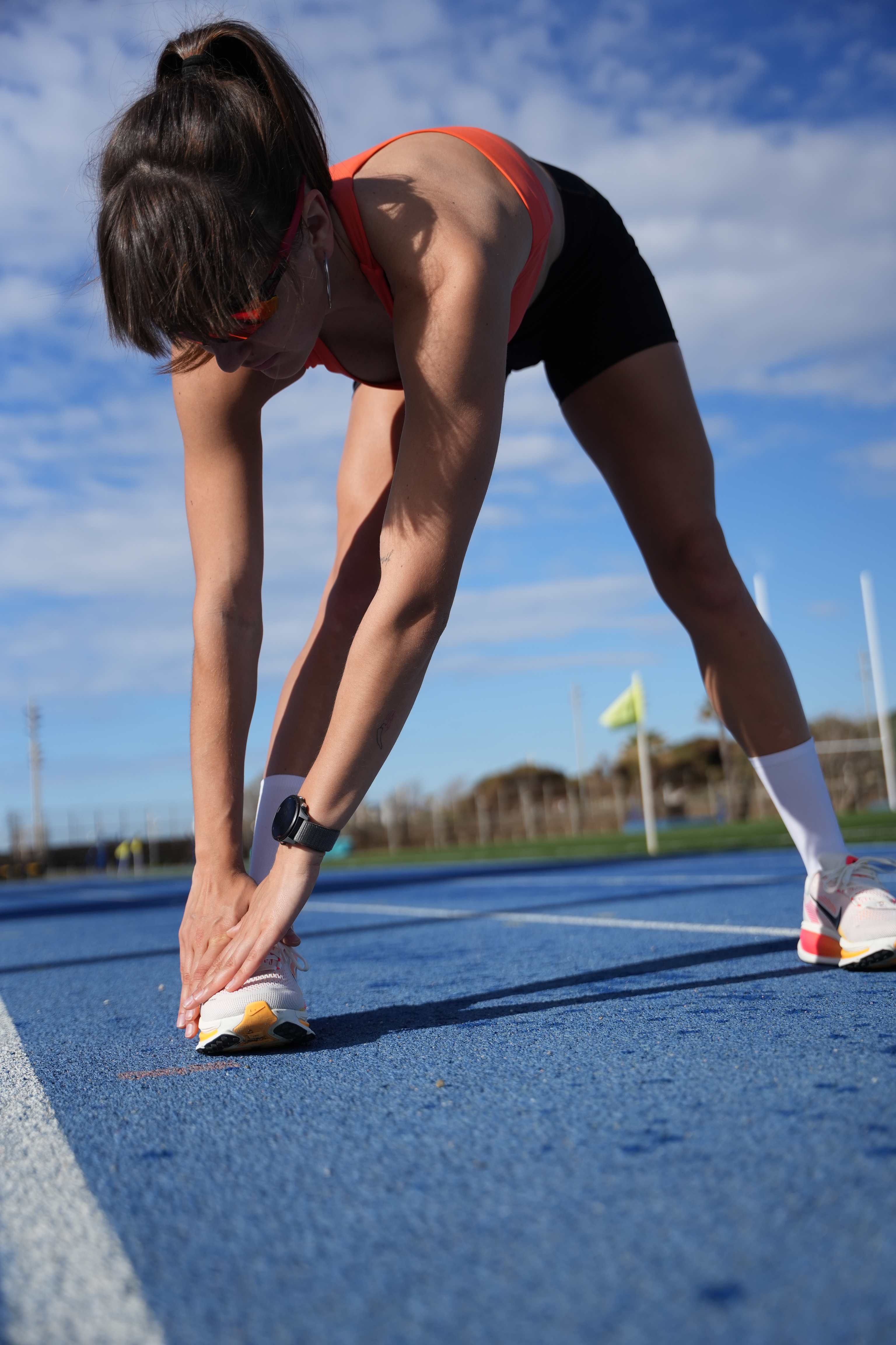 Sports photographer Barcelona - Athletic starting position photography, professional competition photography Spain